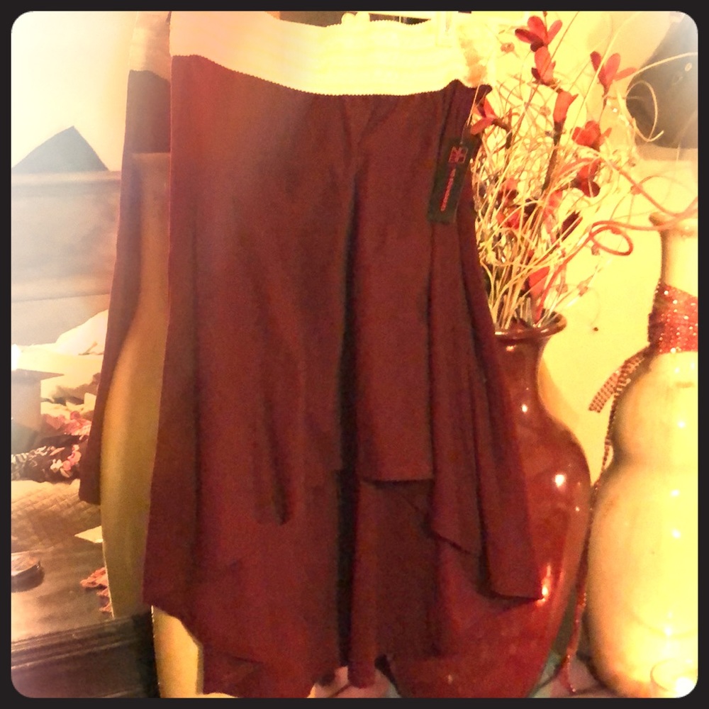 Cute skirts longer in the bottom $ over the knee